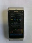 telefon Nokia N8 kolor srebrny plus zasilacz logo T-Mobile